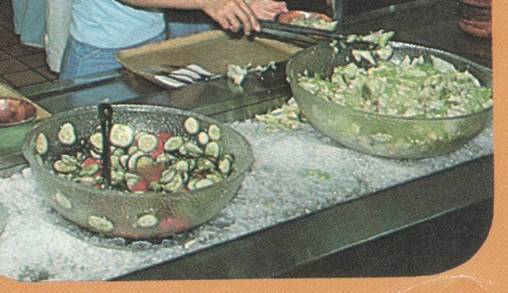 Close-up of salad spilled over the ice at the Stenner Glen dining hall