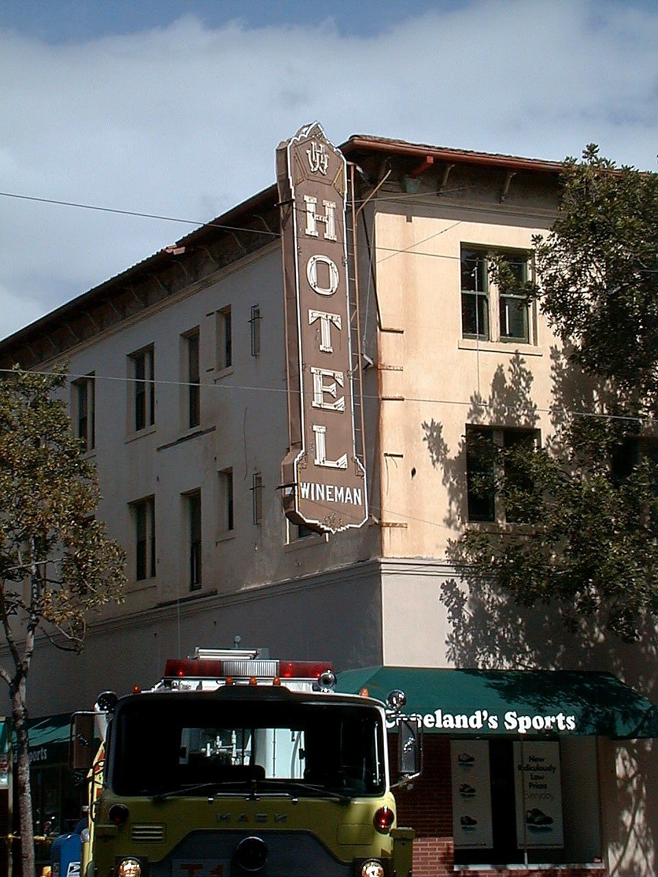 Close view of the old Wineman Hotel sign with a fire truck below it, April 1999