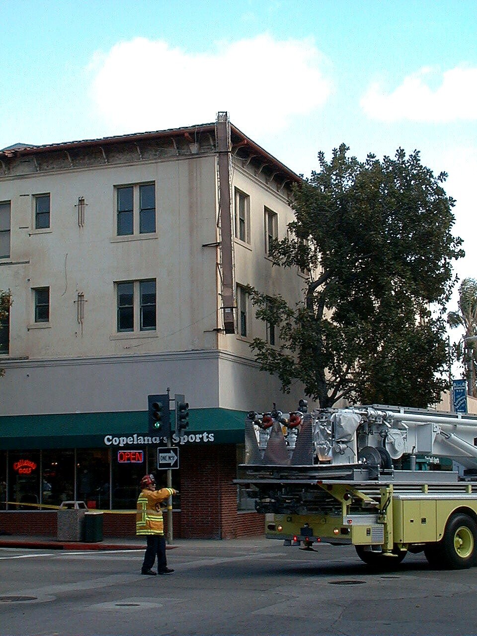 Fire truck positioned beside the Wineman Hotel building during the sign incident, April 1999